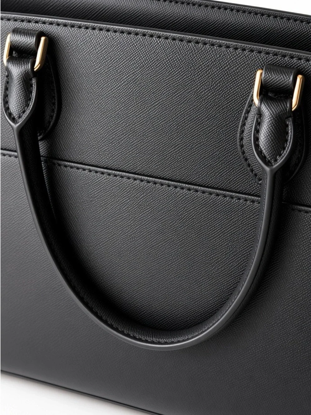 Kate Spade New York black saffiano leather satchel.
